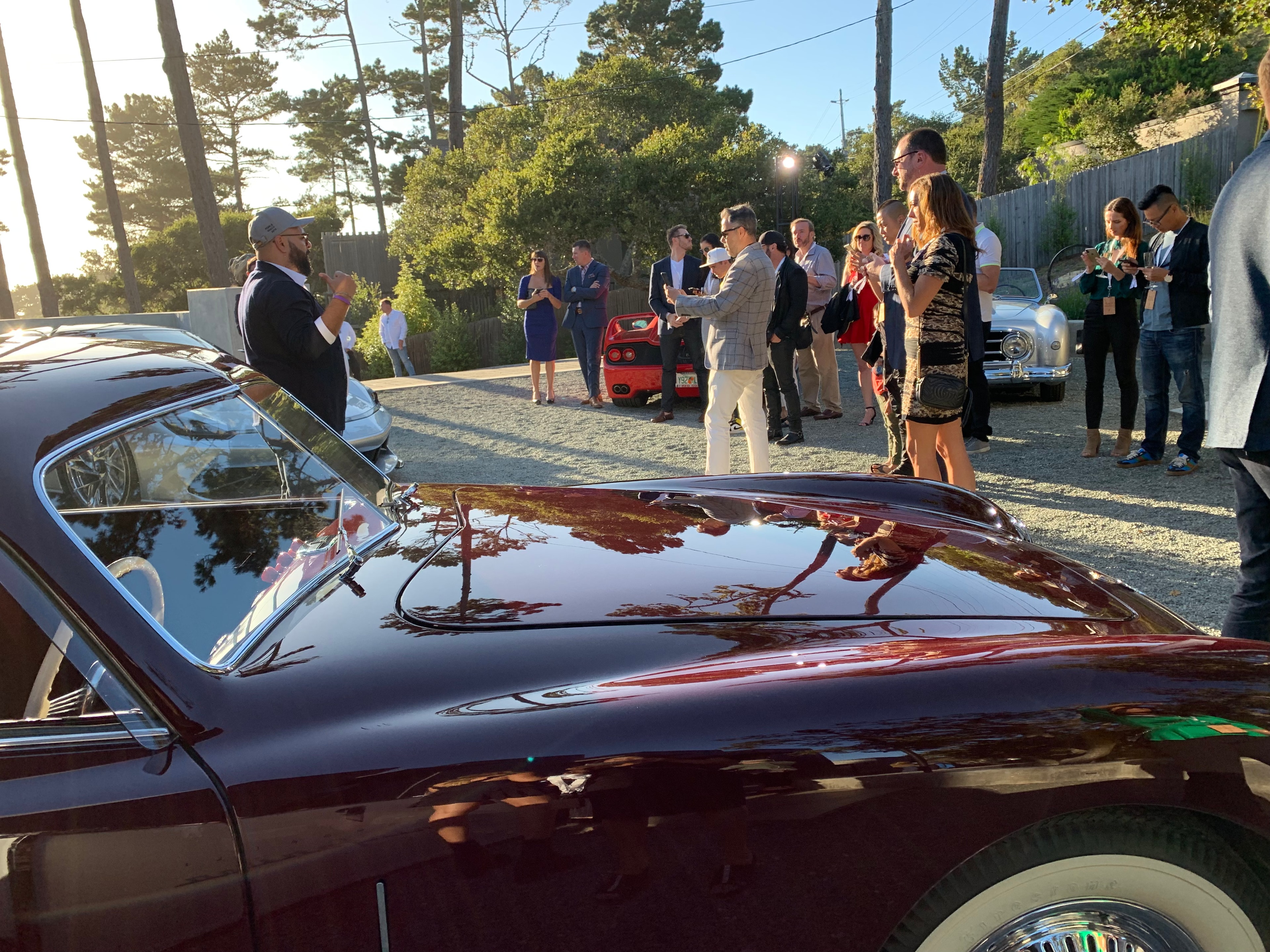 Classic car gathering with guests at Pebble Beach