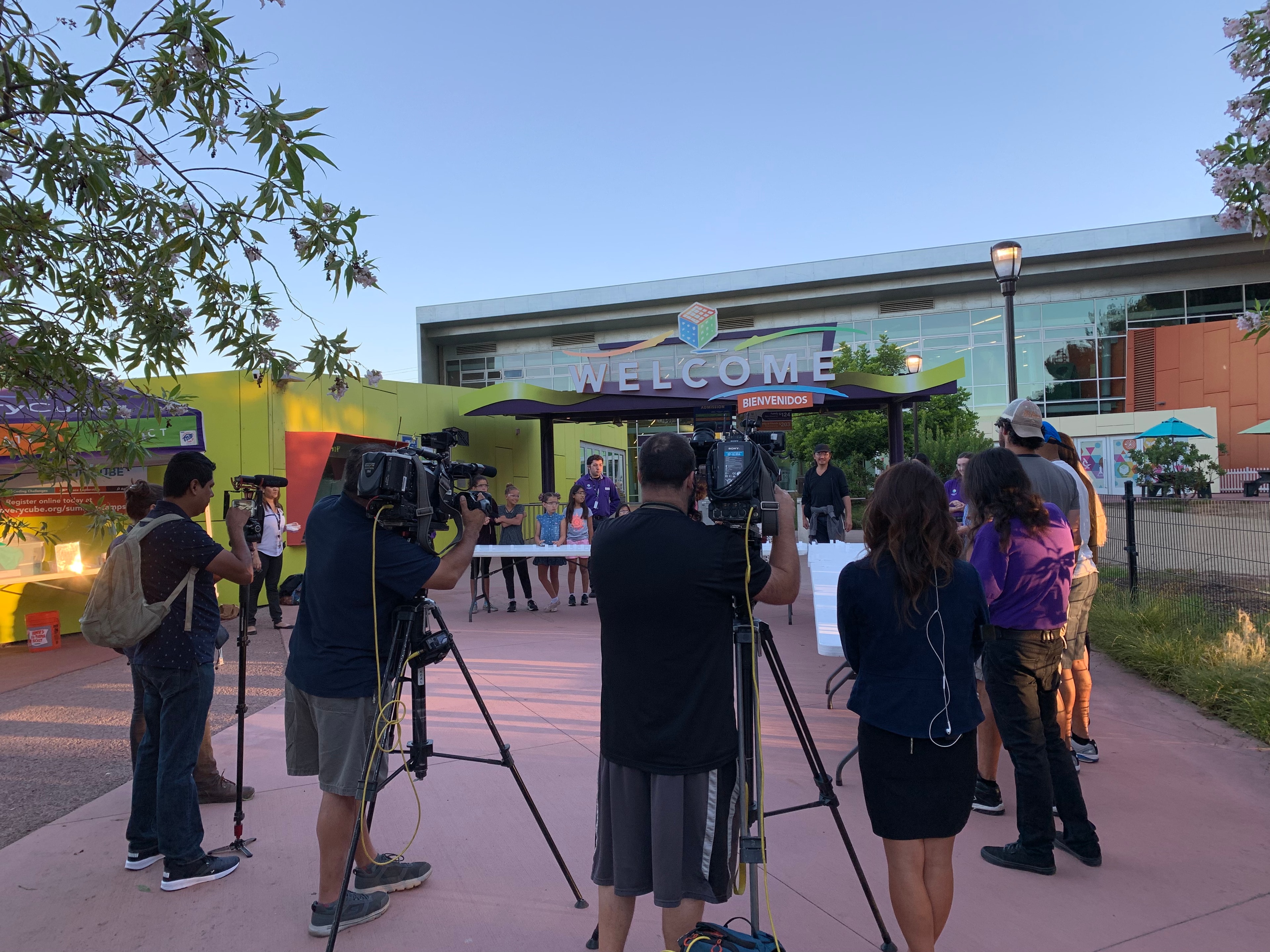 Camera crew filming at a live event